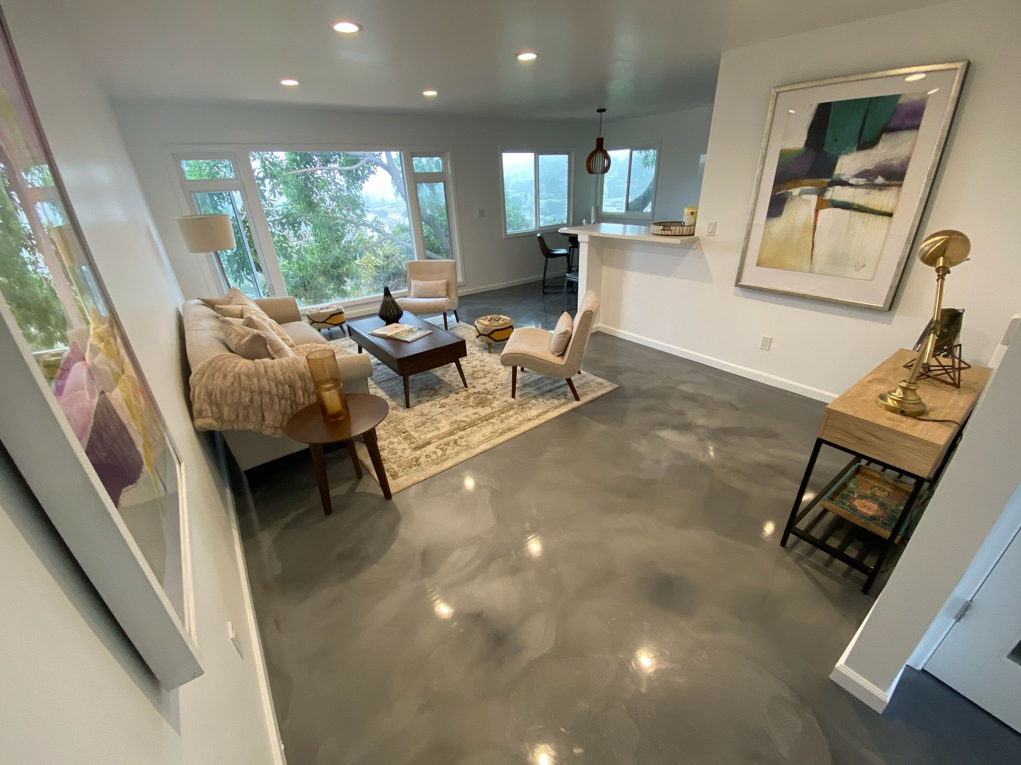 Epoxy Metallic Flooring in a Modern Living Room by Jak's Colors