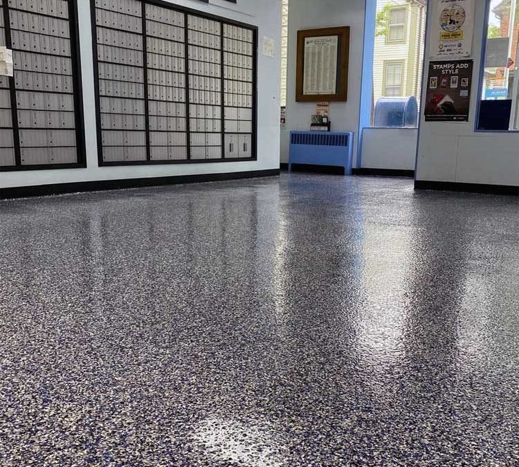 First-Class Floors with Flakes System Greenwich 2 Close-up view of decorative flakes system flooring showing texture and color variety by Jaks Colors