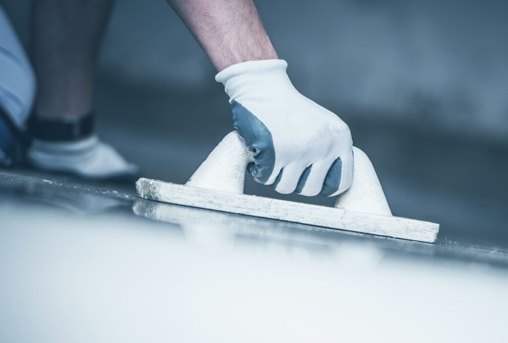 Close-up of smooth self leveling concrete floor in Greenwich, with a seamless finish.