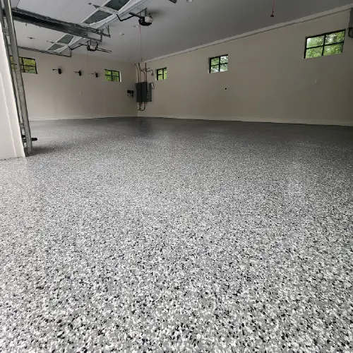 Decorative epoxy flake flooring by JAK’s Colors